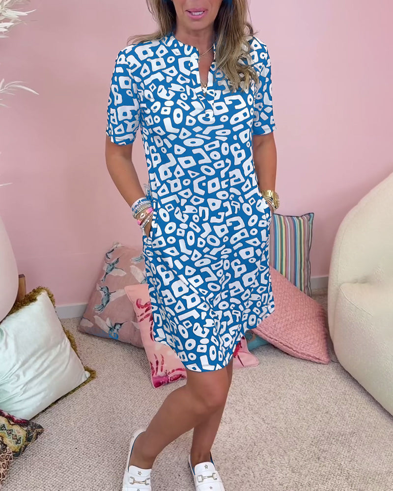 Viaro™ | Stylish Printed Dress with V-Neck and Pockets