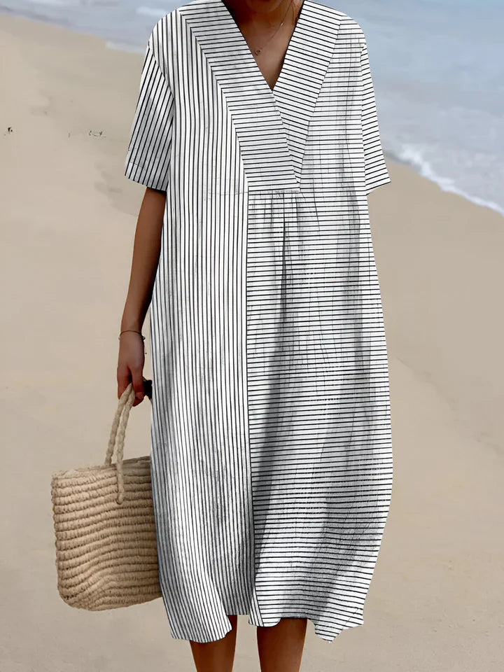 Olalla | Chic summer dress featuring bold, colourful designs