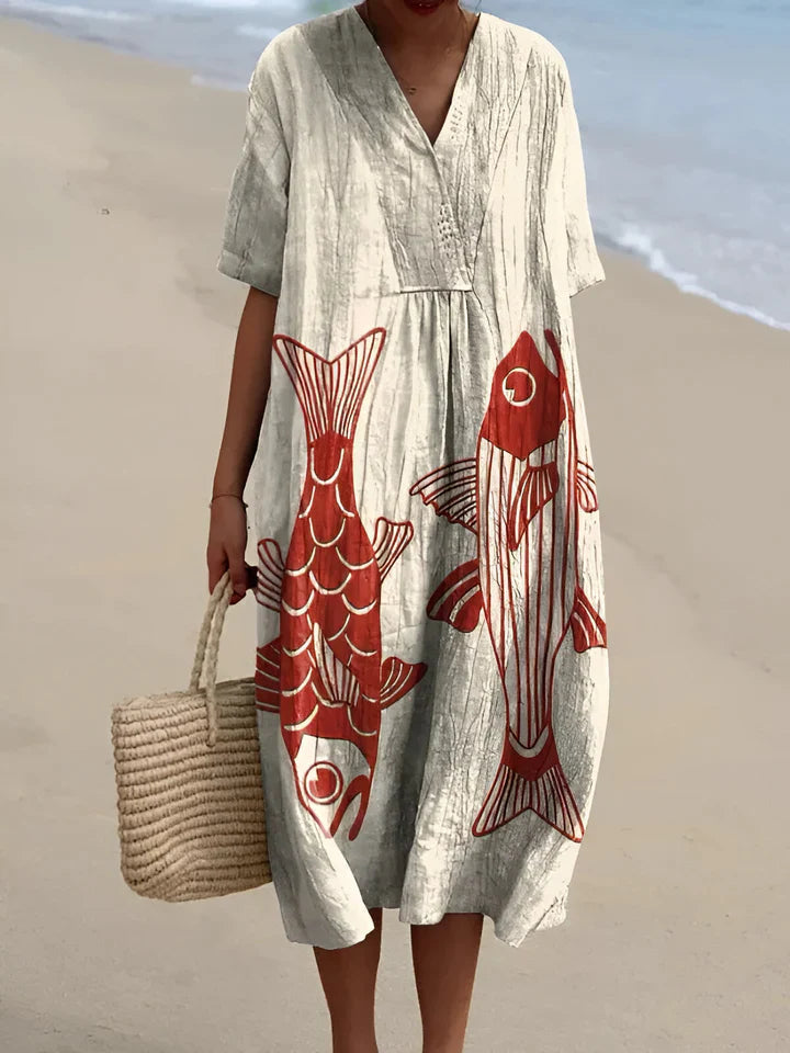 Olalla | Chic summer dress featuring bold, colourful designs